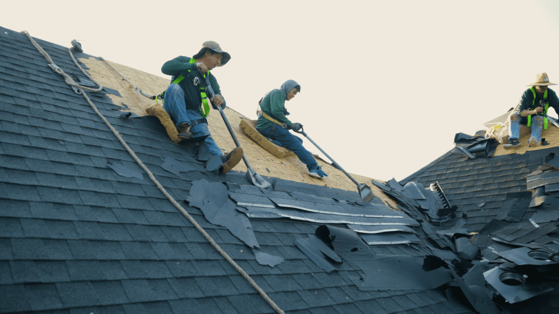 Roofers replacing roof