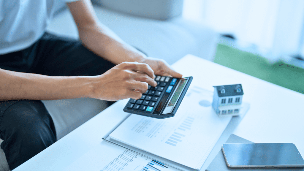 Man calculating expenses