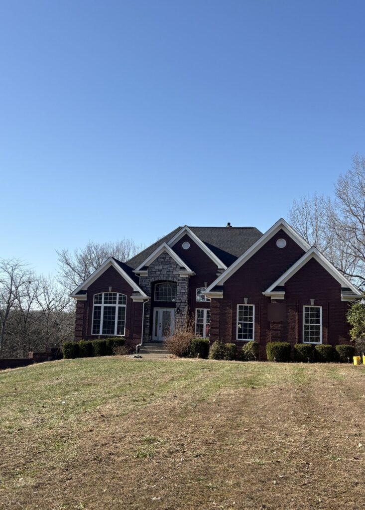 Completed roof replacement on Hollow-Hills Road in Mount Washington, KY: TAMKO Titan XT in Rustic Black